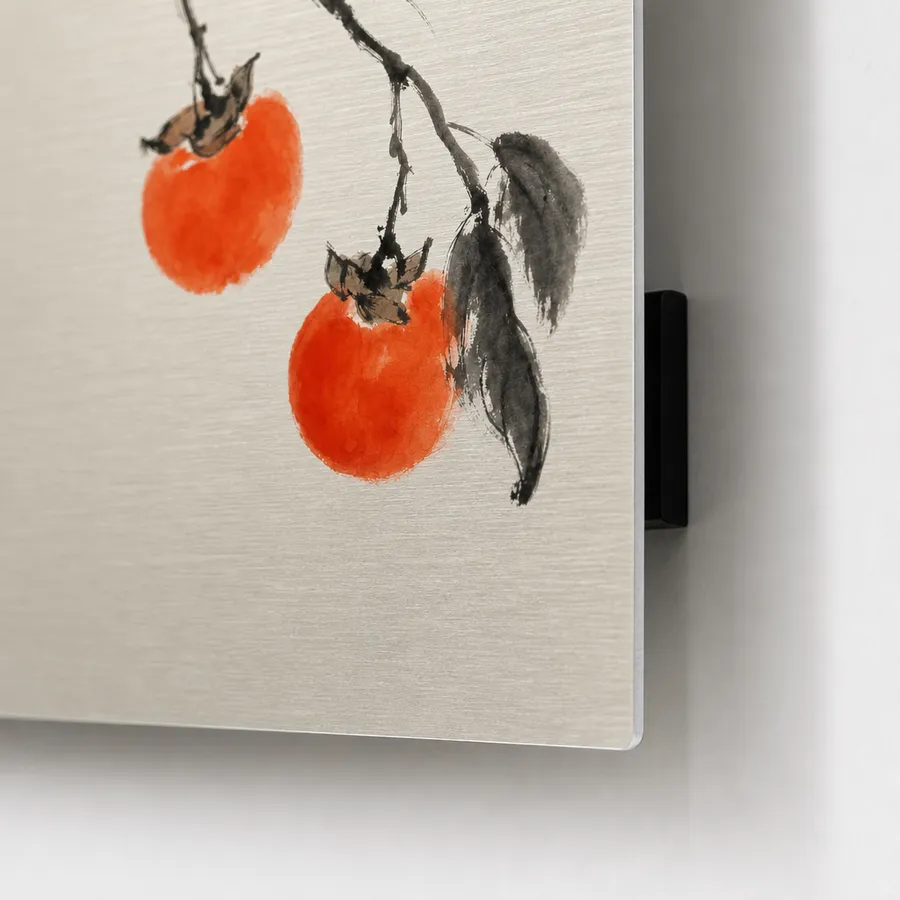 A persimmon print on brushed aluminum, standing off the wall on a hidden mount
